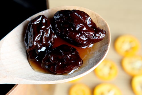 prunes on spoon