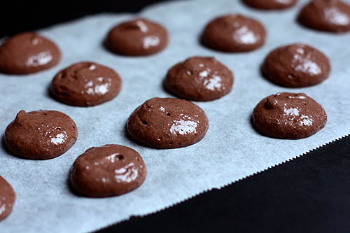 piped french chocolate macarons