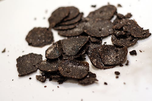 sliced black truffles with salt