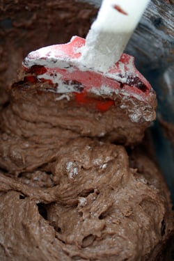 mixing chocolate cupcake batter