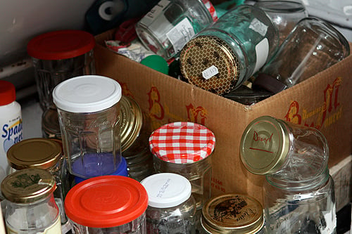 recycled food jars turned storage jars with glass knob tops