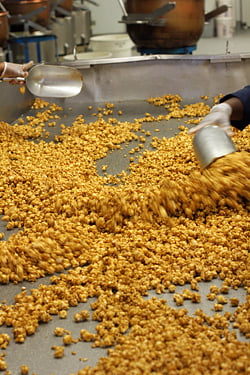 mixing up caramel corn