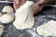 forming pizza dough rounds