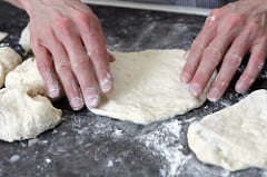 forming pizza dough rounds