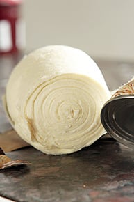 unrolling croissant dough