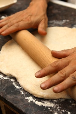 rolling pizza dough