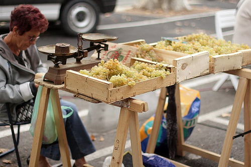 grape seller at market