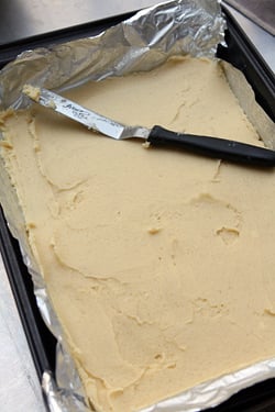 gooey cake batter in pan