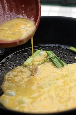 making a kimchi omelet