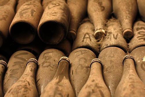 Dusty champagne bottles