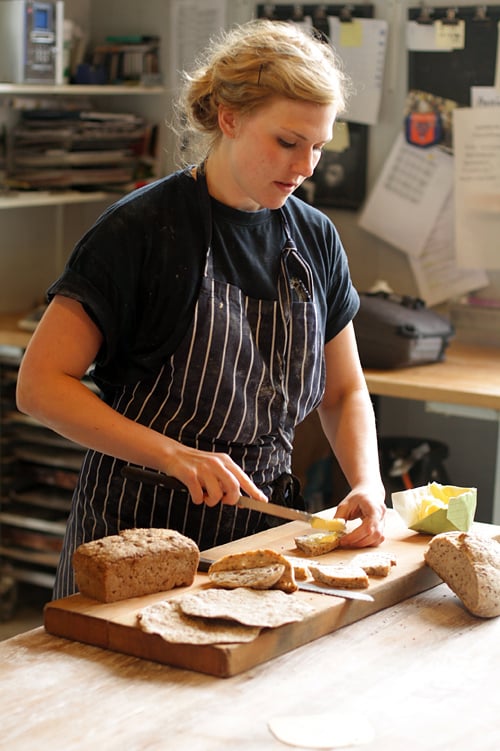 buttering bread at Rosendals Trädgård