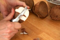peeling coconut