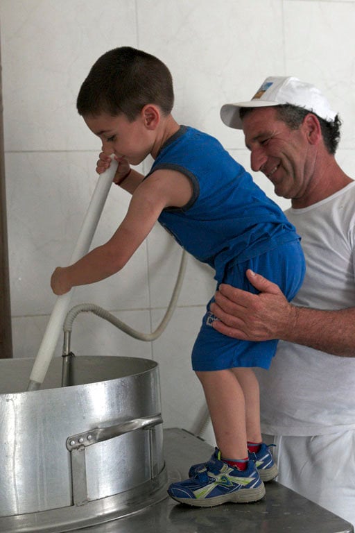 making ricotta with his son