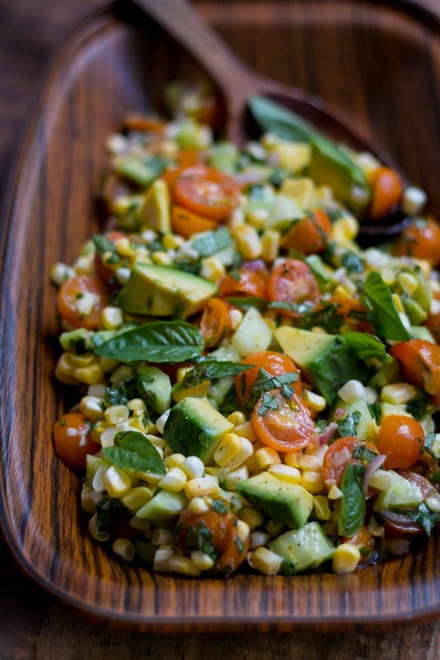 Fresh corn, tomato, avocado and basil salad