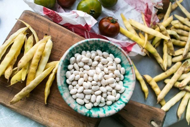 Shelling beans for Tomato salad with basil vinaigrette